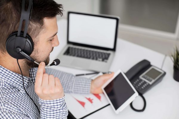 businessman-talking-phone (1) Call Answering Service with Langham Virtual Assistant